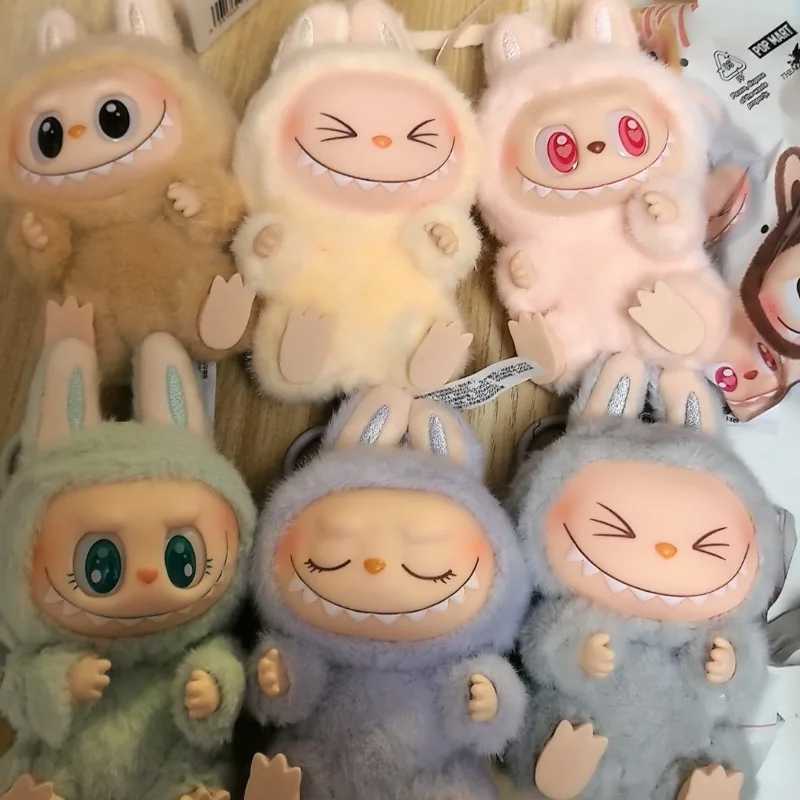 The real Labubu has an exciting seat Macarons series blind box trend game vinyl base doll mystery box series model toy gift T250415