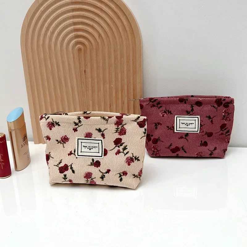 New small womens makeup bag floral pattern small sanitary napkin storage bag coin key box portable card bagXJ250415