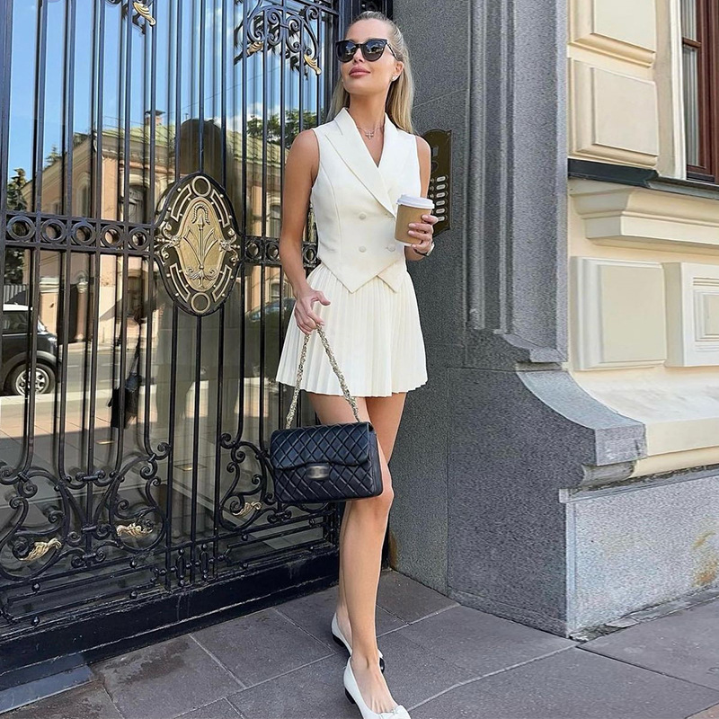 2025 New free shipping designer dresses for womens casual dresses white black Summer new fashionable collar irregular top pleated skirt casual set