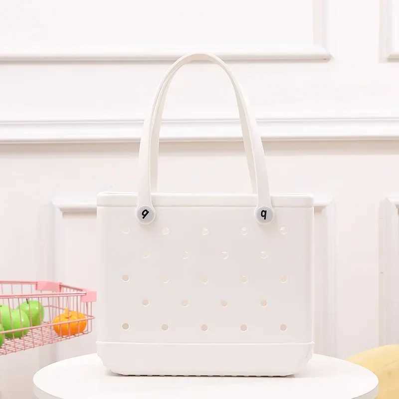 Fashion ladies bag is a stylish and minimalist hollow candy colored portable vegetable basket handbag W250415