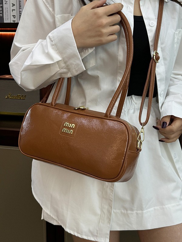 designer bag 2025 Shiny waxed leather handbag versatile for commuting bowling-style single-shoulder and crossbody bag
