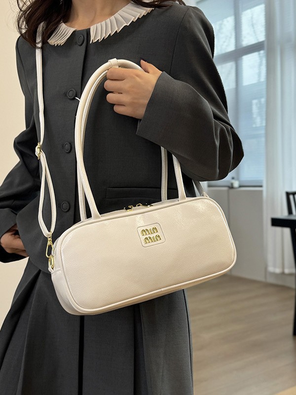 designer bag 2025 Shiny waxed leather handbag versatile for commuting bowling-style single-shoulder and crossbody bag