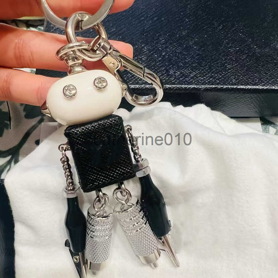 Robot pendant keychain leather bag hanging paired with artifact enamel emblem hanging decoration J250416
