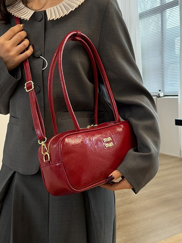 designer bag 2025 Shiny waxed leather handbag versatile for commuting bowling-style single-shoulder and crossbody bag