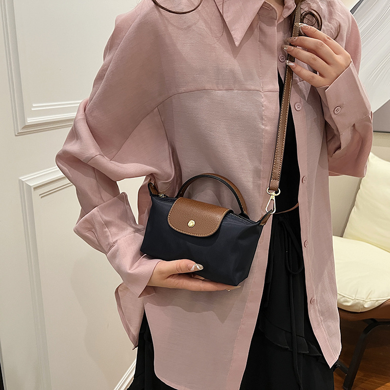 2025 Retro fashion all-match cross-border bestseller spring/summer women's bag single shoulder crossbody hand-held high-end nylon dumpling bag ne