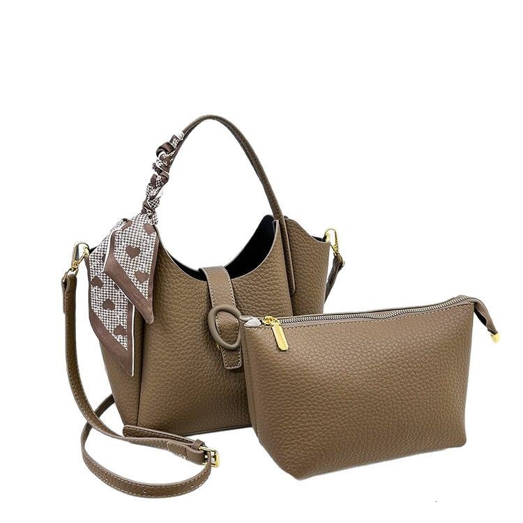 Designer 2025S soft leather niche handbag fashionable women versatile large capacity shoulder crossbody bucket bag