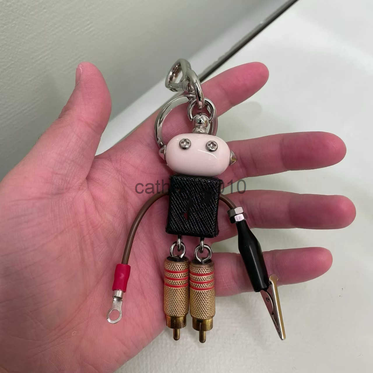 Robot pendant keychain leather bag hanging paired with artifact enamel emblem hanging decoration J250416