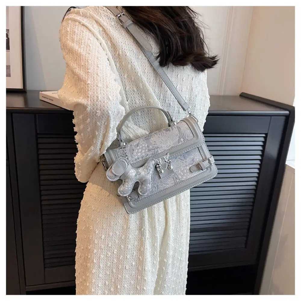 Elegant embossed shoulder bag with metal buckle square bottom bag and exquisite cross shaped body bag Y250417