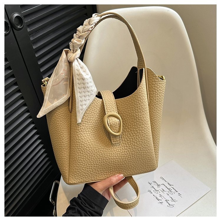 Designer 2025S soft leather niche handbag fashionable women versatile large capacity shoulder crossbody bucket bag
