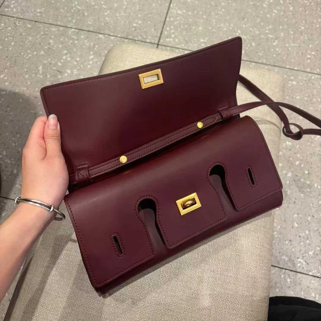 Genuine leather handbag 2025 new niche design lock small square bag vintage motorcycle style cowhide one-shoulder crossbody bagW251115