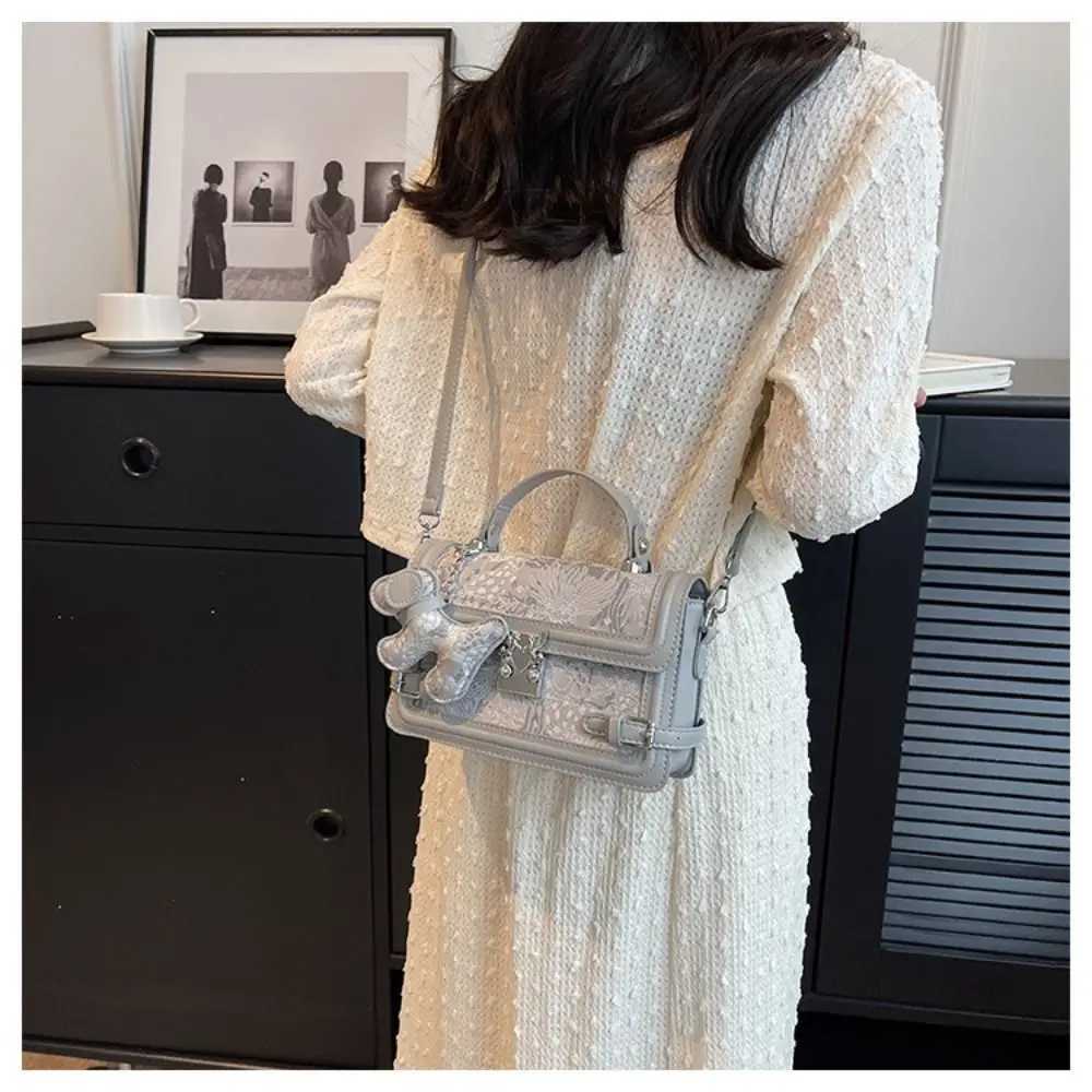 Elegant embossed shoulder bag with metal buckle square bottom bag and exquisite cross shaped body bag Y250417
