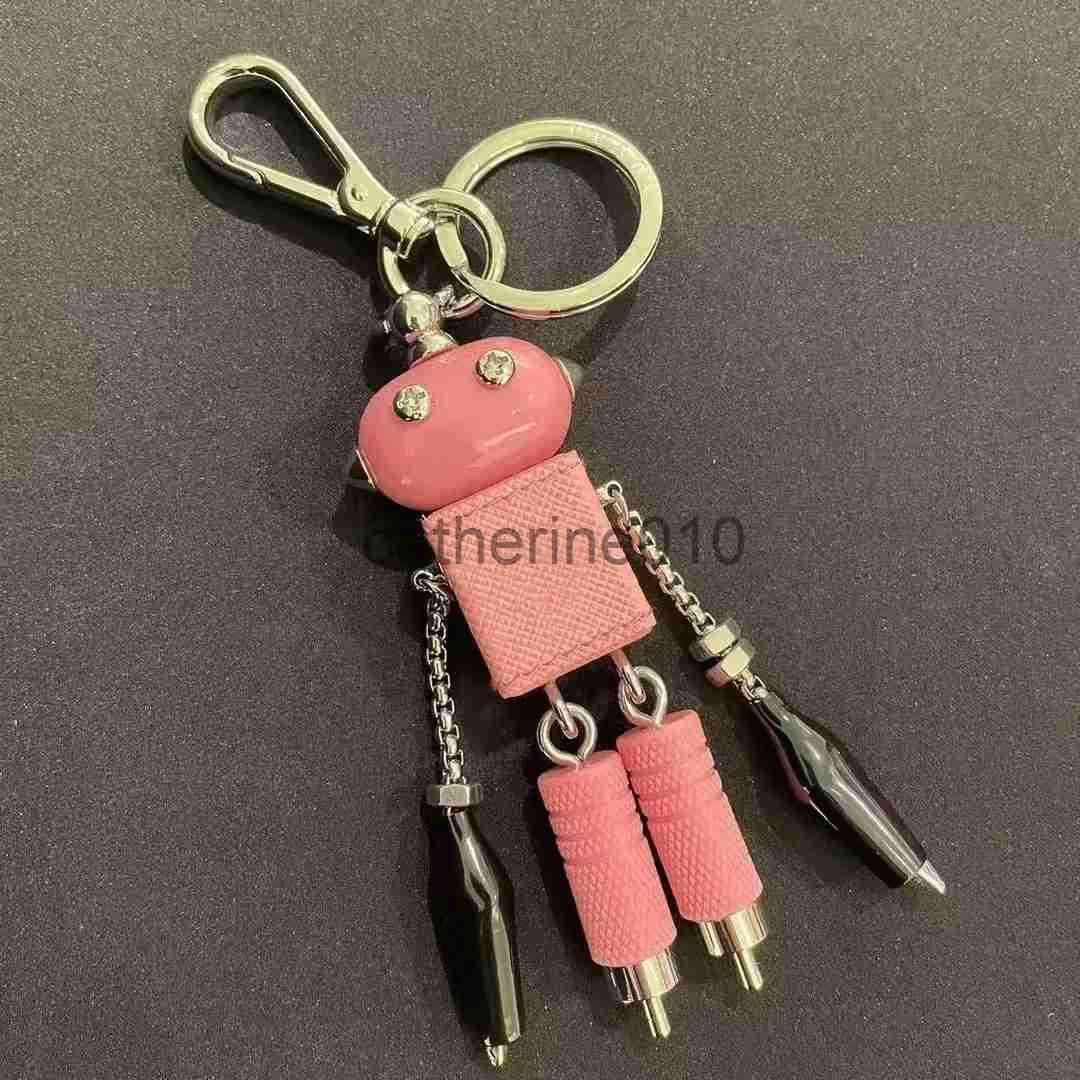 Robot pendant keychain leather bag hanging paired with artifact enamel emblem hanging decoration J250416