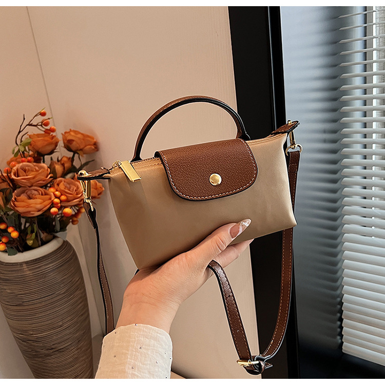 2025 Retro fashion all-match cross-border bestseller spring/summer women's bag single shoulder crossbody hand-held high-end nylon dumpling bag ne