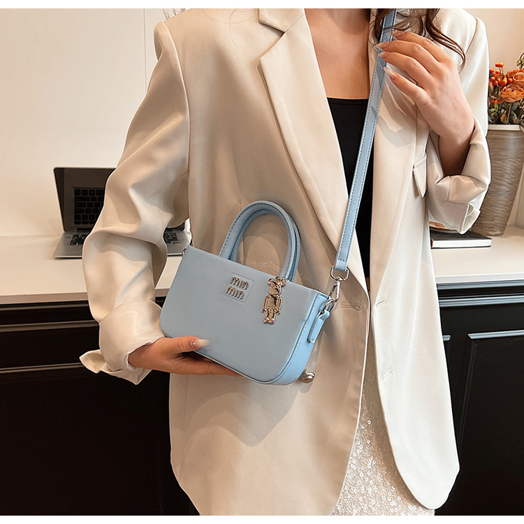 designer bag 2025 new Women's popular small handbag with high sense of luxury simple hand-held single shoulder crossbody bucket bag trendy