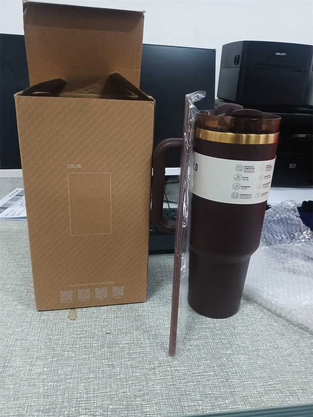 The new Real Picture 40 ounce chocolate brown color with a gold bottom drum for laser engraved insulated travel cups in 2025 keeping you cool S25417