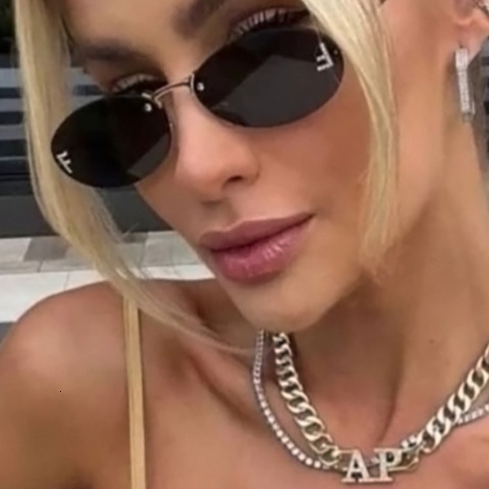 Sunglasses Elliptical frame sunglasses new fashion personality glasses featuring F letter dot diamond sunglasses AA