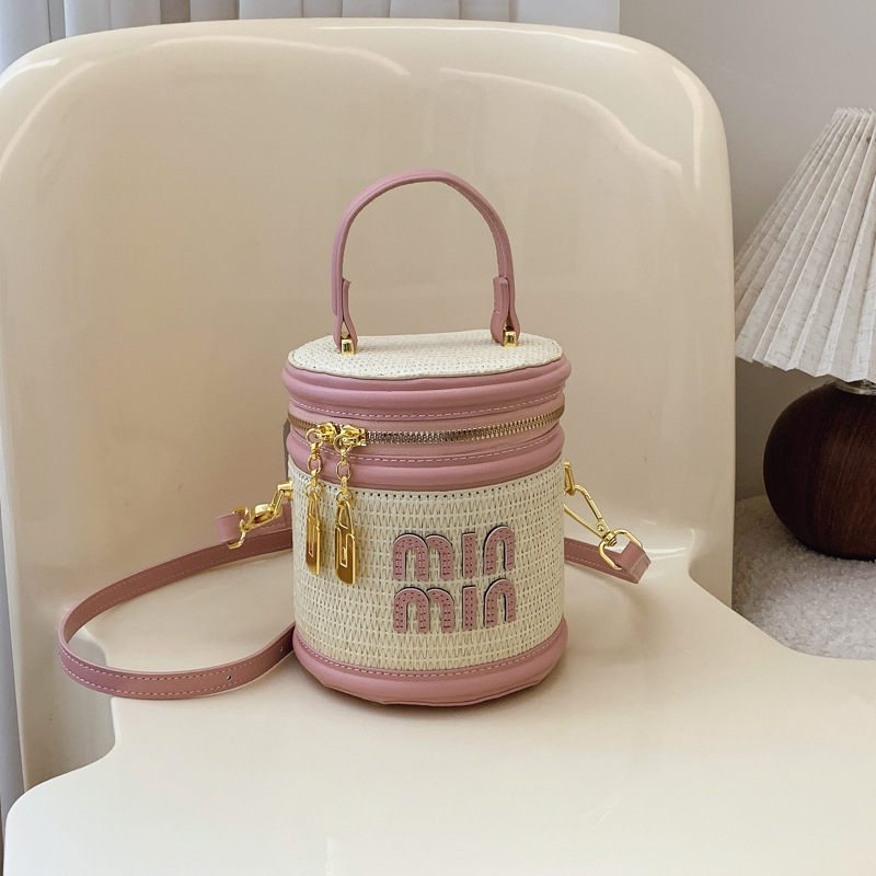 designer bag 2025 new Women's small rattan bag, fashionable and trendy niche crossbody bag textured contrasting color letter hand-held bucket bag