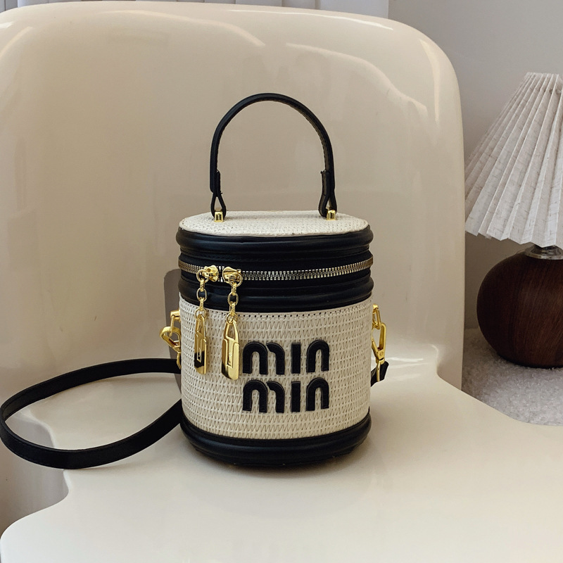 designer bag 2025 new Women's small rattan bag, fashionable and trendy niche crossbody bag textured contrasting color letter hand-held bucket bag