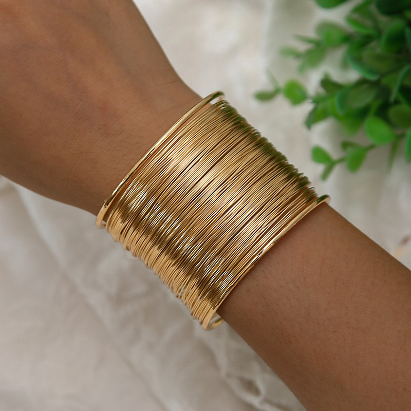 Eye-Catching Wide Wire Bracelet for Women - Classic Gold Plated Hyperspherical Hand Accessory