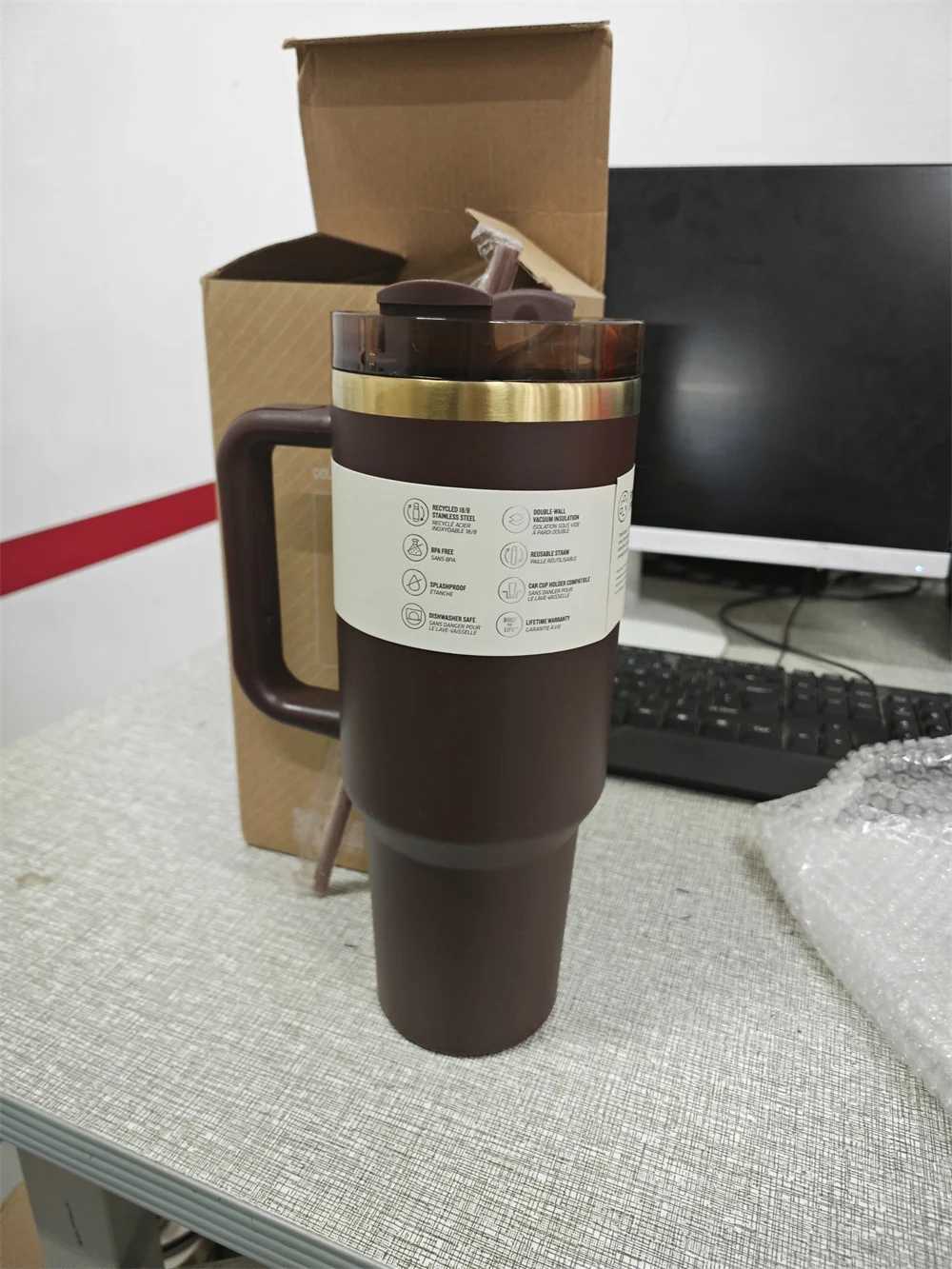 The new Real Picture 40 ounce chocolate brown color with a gold bottom drum for laser engraved insulated travel cups in 2025 keeping you cool S25417