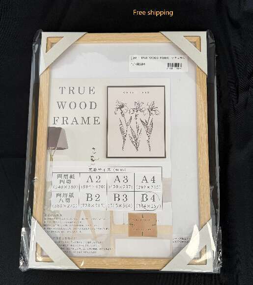 There are designer style vintage solid wood photo hanging on the wall, with empty frames used for calligraphy and painting mounting H260306