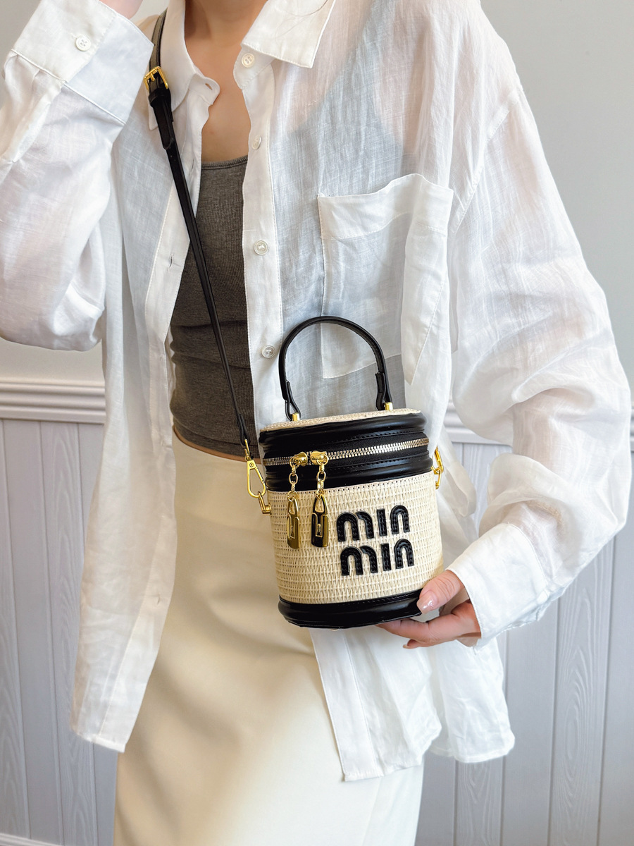 designer bag 2025 new Women's small rattan bag, fashionable and trendy niche crossbody bag textured contrasting color letter hand-held bucket bag