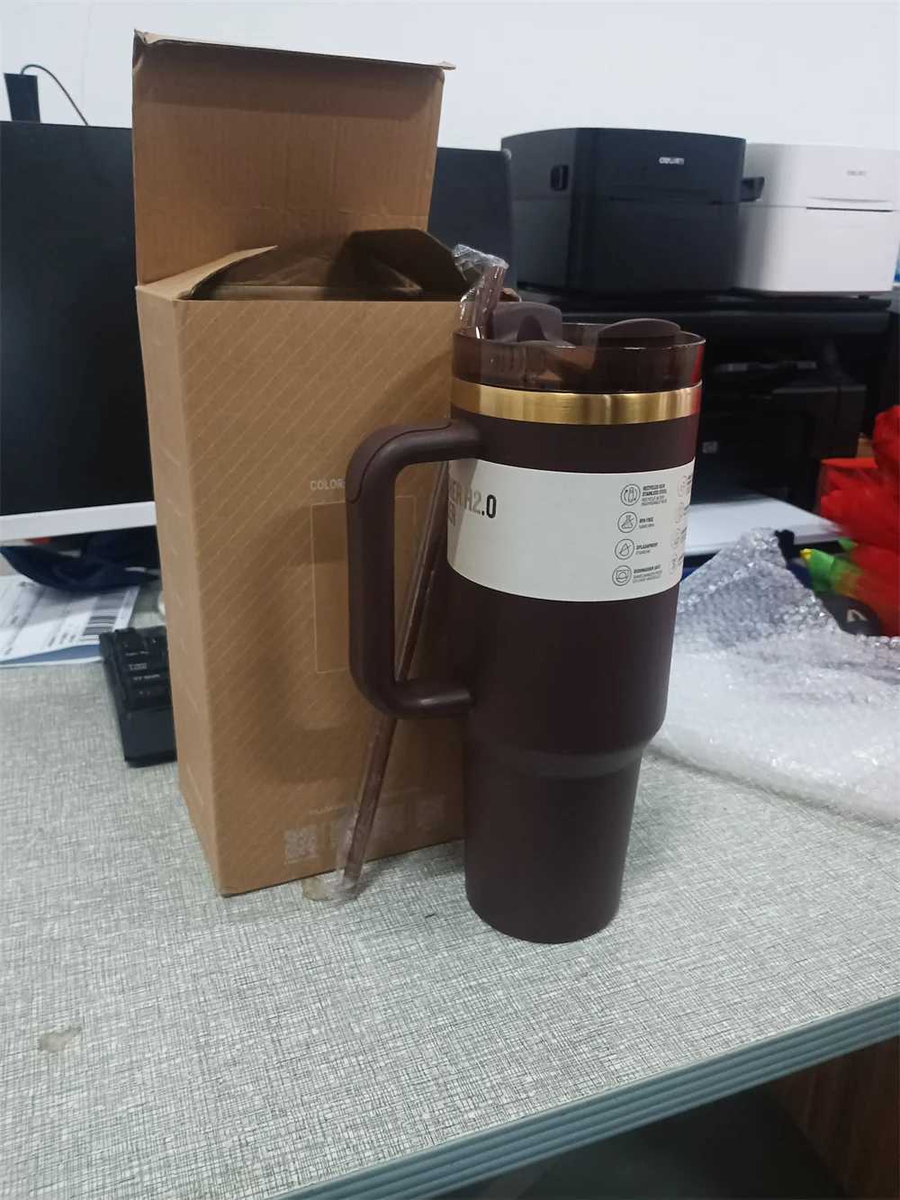 The new Real Picture 40 ounce chocolate brown color with a gold bottom drum for laser engraved insulated travel cups in 2025 keeping you cool S25417