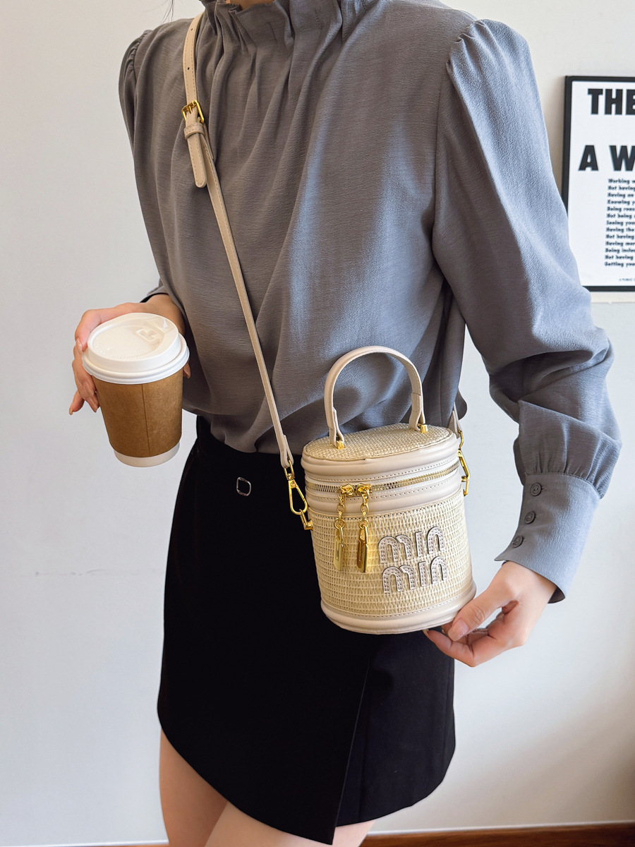 designer bag 2025 new Women's small rattan bag, fashionable and trendy niche crossbody bag textured contrasting color letter hand-held bucket bag