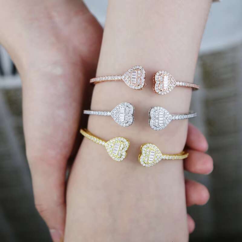 DHCollections Halo Heart Full of Dias CZ Bangles Gold Plated Spring Clasp Iced Out Open C Shaped Bangle Bracelet