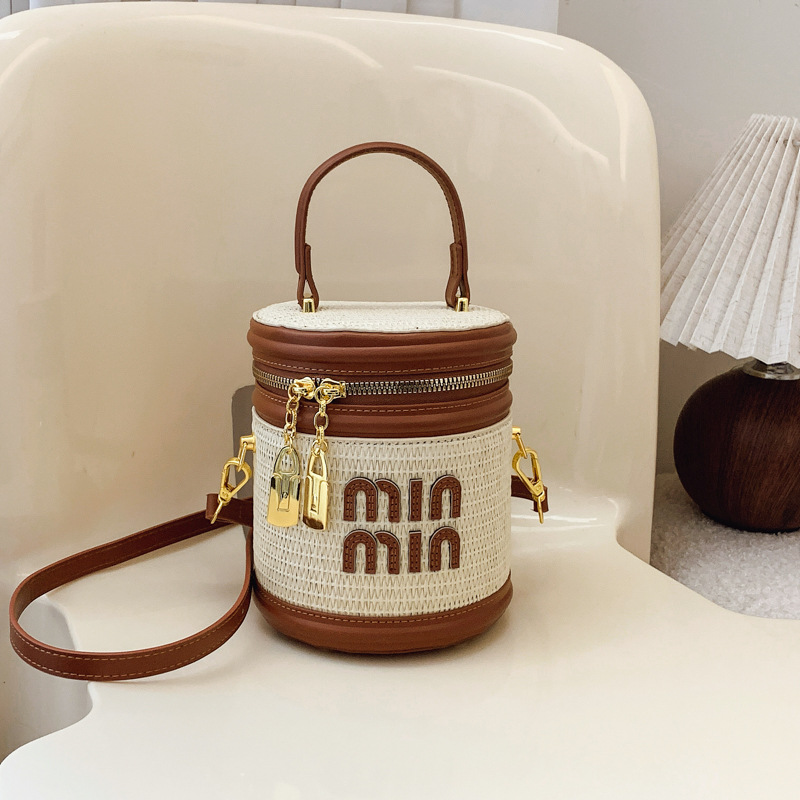 designer bag 2025 new Women's small rattan bag, fashionable and trendy niche crossbody bag textured contrasting color letter hand-held bucket bag