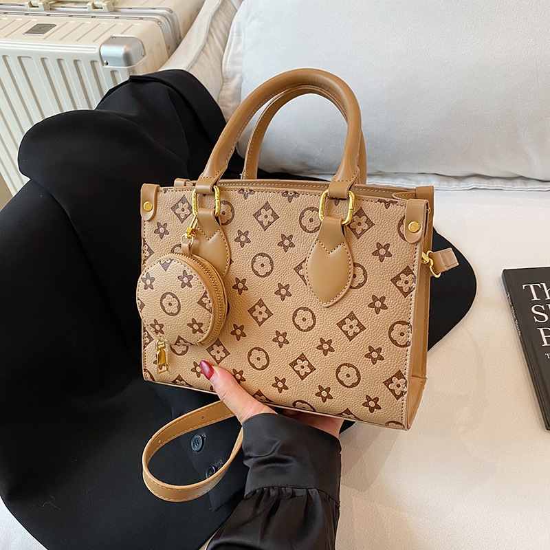 Free shipping designer women's new fashionable printed shoulder bag trendy armpit tote outdoor hand-held diagonal cross bag