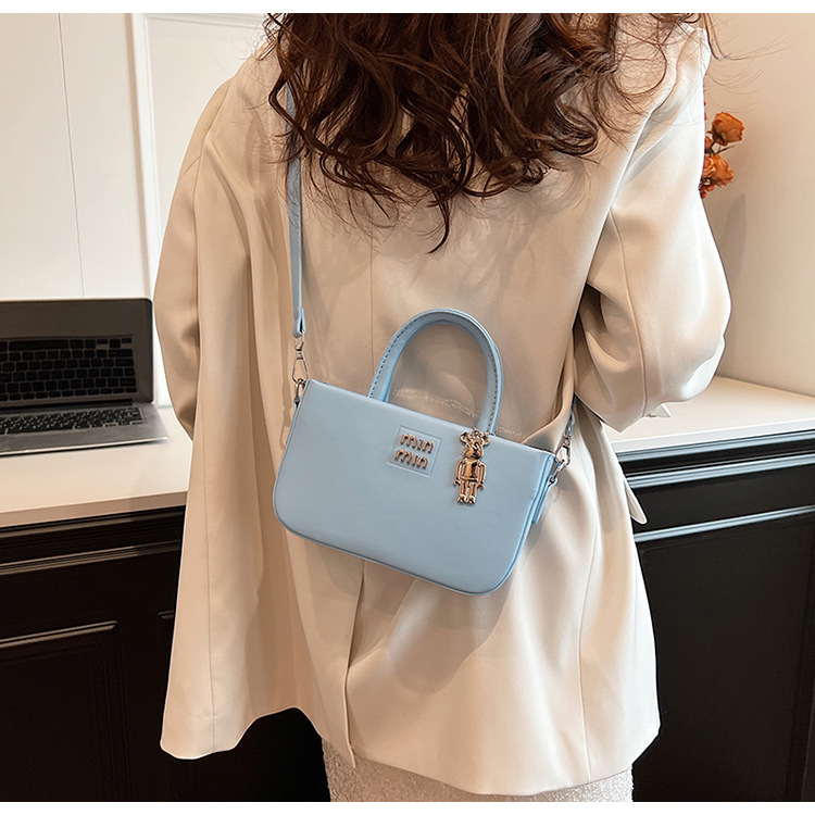 designer bag 2025 new Women's popular small handbag with high sense of luxury simple hand-held single shoulder crossbody bucket bag trendy