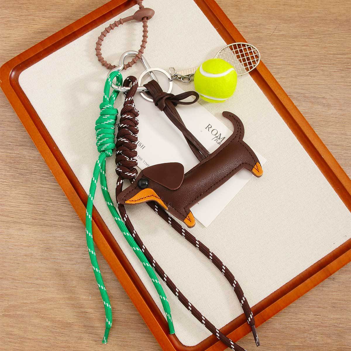 designer bag charm fashion series retro pu dachshund dog small book heart tennis ball braided rope bag pendant keychain wholesale - view 4