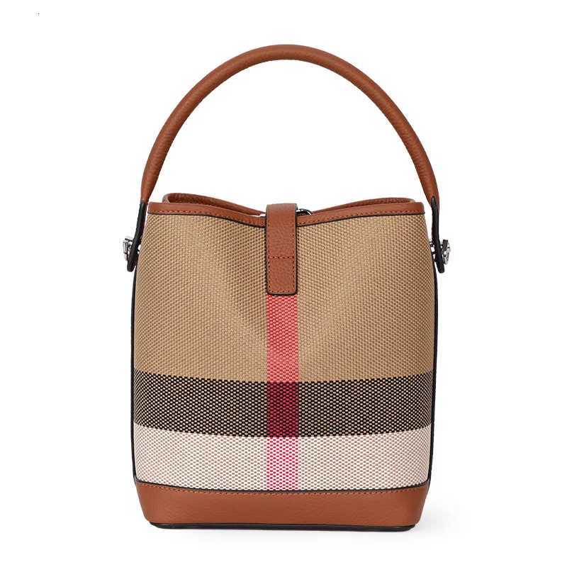 New canvas paired with cowhide womens shoulder crossbody bag fashionable plaid pattern bucket bagW251115