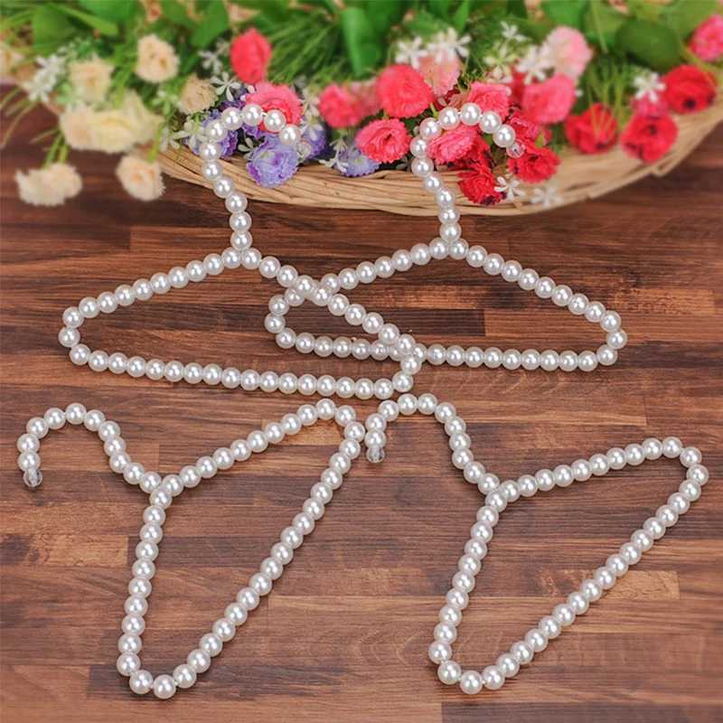 1Pcs Childrens pearl hanger 22cm fashion dog clothes baby hanger pearl bow cute pet hanger C251117