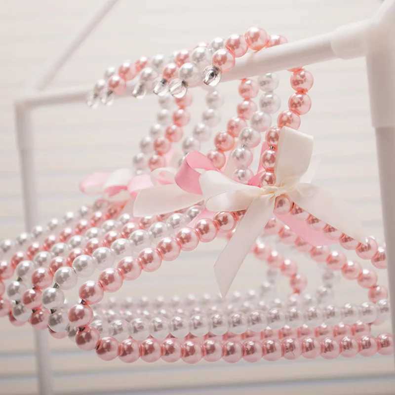 1Pcs Childrens pearl hanger 22cm fashion dog clothes baby hanger pearl bow cute pet hanger C251117
