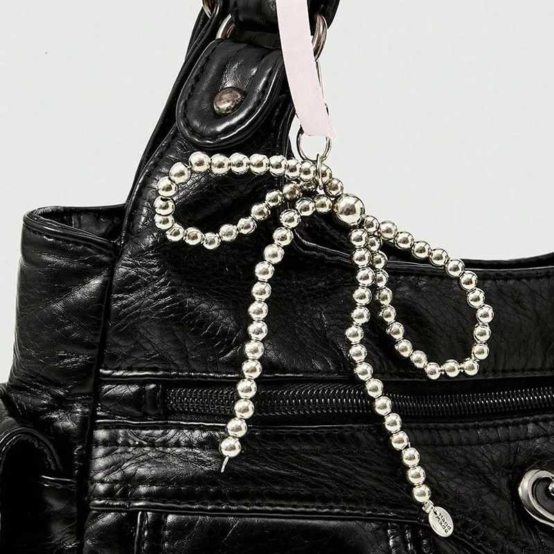 Fashionable handbag with bow pendant niche design large capacity womens armpit bag suitable for commuting to work shoppingW251117