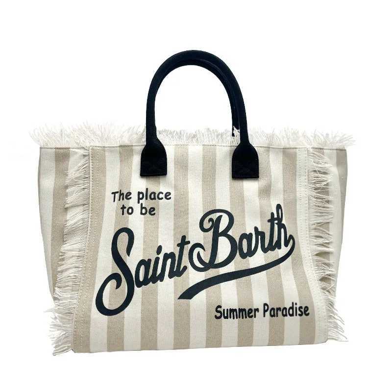 New Womens Large Capacity Casual Beach Canvas Striped Tassel Handbag from Saint Bart Europe and the United StatesW250420