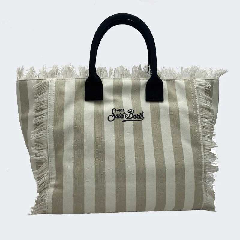 New Womens Large Capacity Casual Beach Canvas Striped Tassel Handbag from Saint Bart Europe and the United StatesW250420
