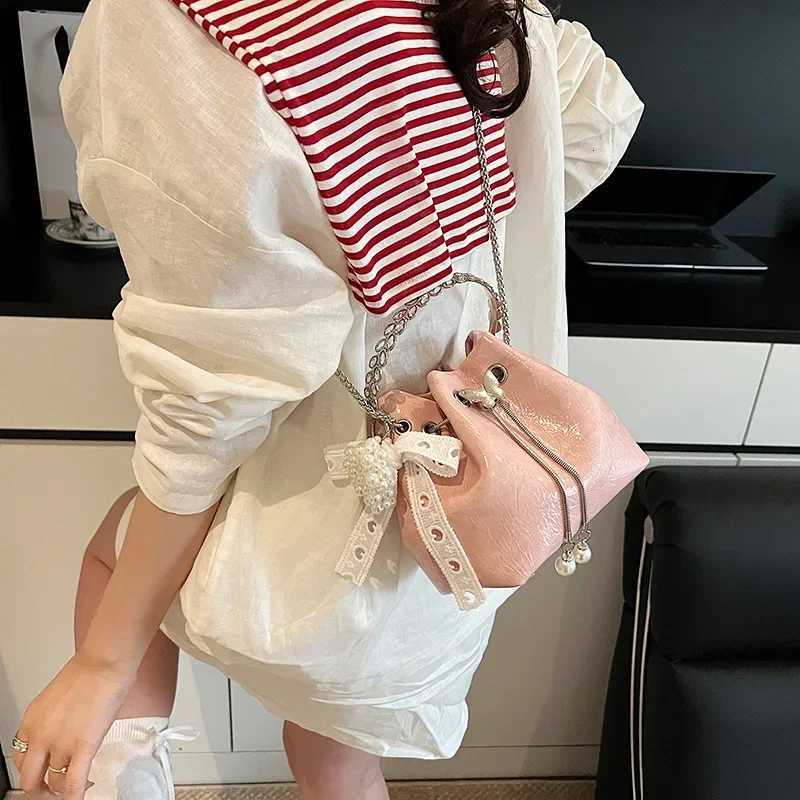 Summer Solid Color Mini Chain Crossbody Bag High-Grade Sense Soft Leather Drawstring Bucket Bags Lady Fashion HandbagsW251118