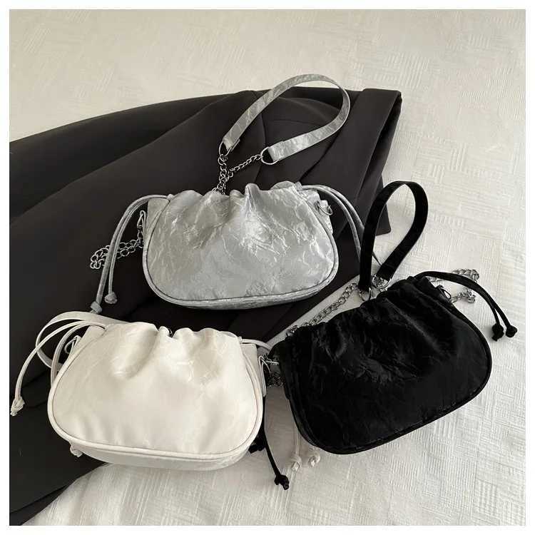 2025 Fashion Women Tote Drawstring PU Leather Bucket Bag Versatile New Handbags Chain Cloud Bag Simple Commute Shoulder BagsW251118