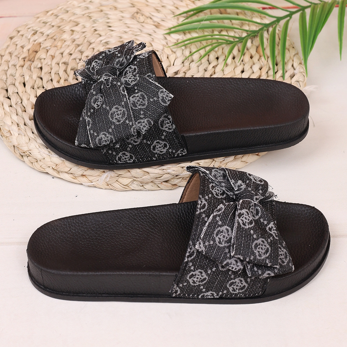 Fashionable large-sized thick-soled bow one-line slippers for women wearing embroidered beach flip-flops in black, pink, khaki and gray