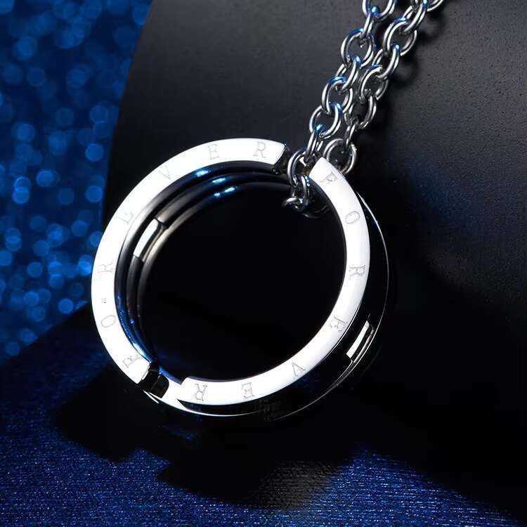 DHCollections Fashion Personality Unique Rotatable Stainless Steel Forever Men Engagement Ring