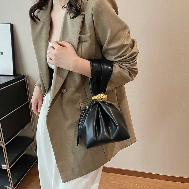 Advanced minimalist casual drawstring bucket bag 2025 new Korean style trendy handbag with concave shape decoration for womenW251118