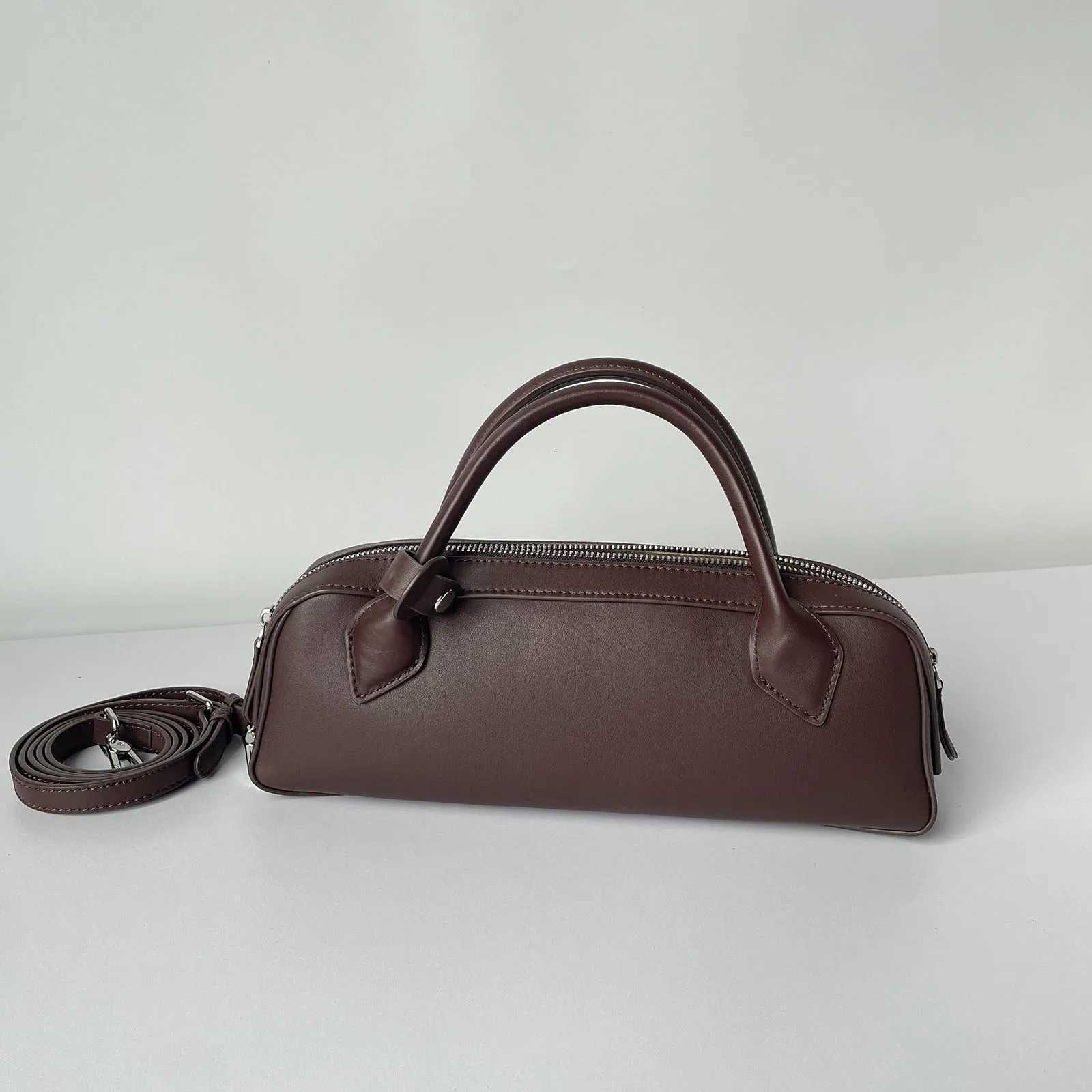 Genuine leather vintage sausage bag 2025 new niche design ins fashion Y2K high-quality cowhide womens simple long handbagW251118