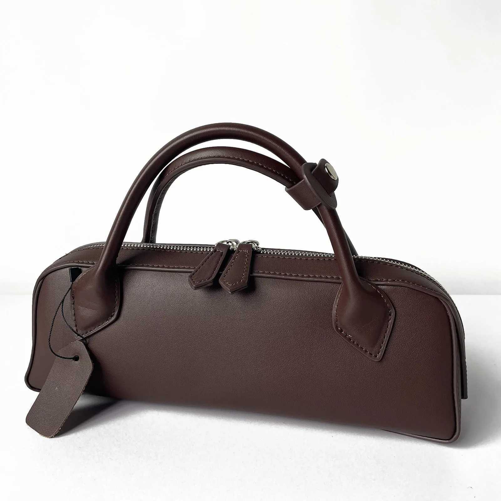 Genuine leather vintage sausage bag 2025 new niche design ins fashion Y2K high-quality cowhide womens simple long handbagW251118