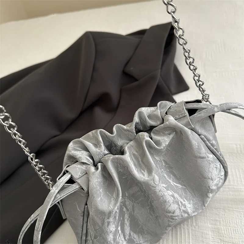 2025 Fashion Women Tote Drawstring PU Leather Bucket Bag Versatile New Handbags Chain Cloud Bag Simple Commute Shoulder BagsW251118