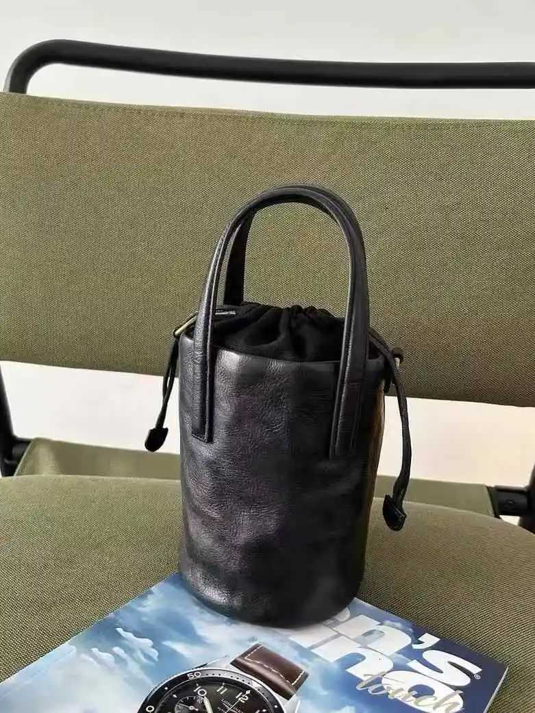 Womens New Retro Drawstring Bucket Bag Black Versatile Simple Handbag PU Leather Single Shoulder Crossbody BagW251118