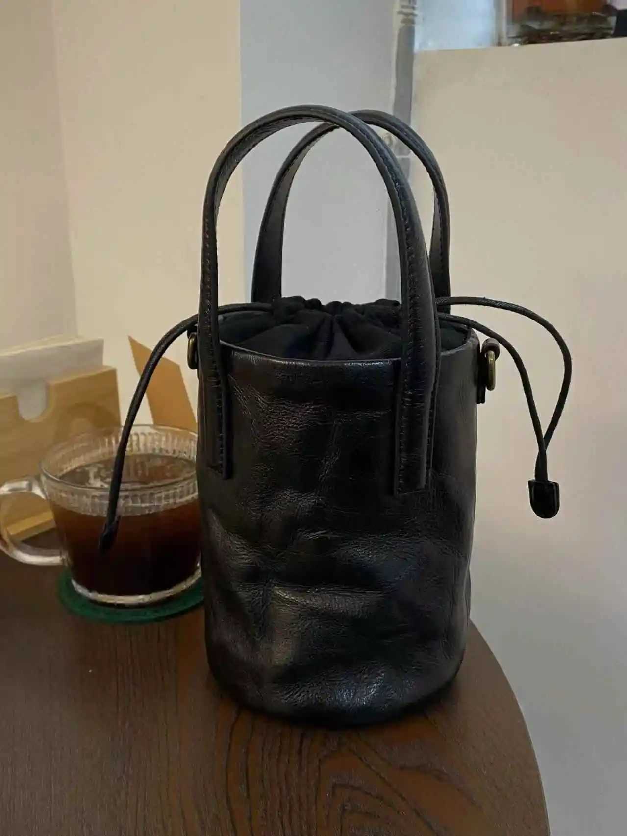 Womens New Retro Drawstring Bucket Bag Black Versatile Simple Handbag PU Leather Single Shoulder Crossbody BagW251118