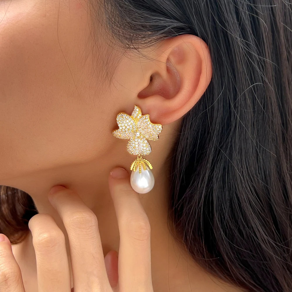 CWWZircon fancy cubic zirconia white gold large leaf flower shaped pendant with long pearl earrings suitable for womens parties CZ507 250414